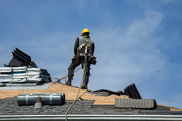 Professional Gutter Installation technician working in Manistee, MI